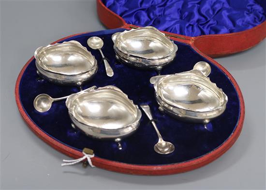 A cased set of four late Victorian silver salts and matching spoons, William Hutton & Sons, London, 1896.